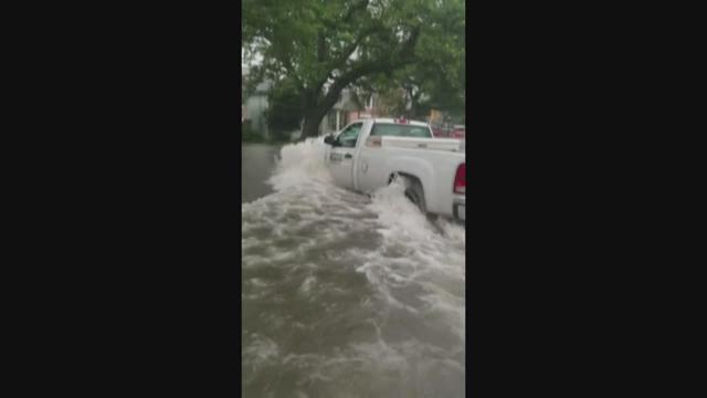 Employee fired after video of truck speeding through flooded streets goes viral